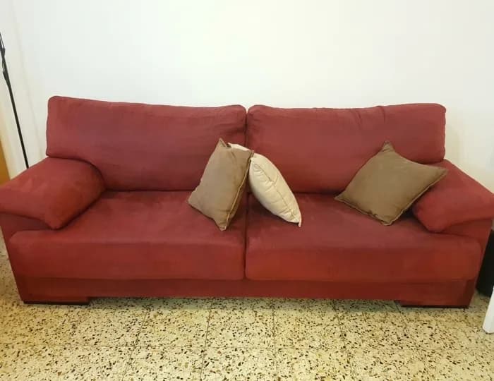 Red suede sofa after a professional deep clean